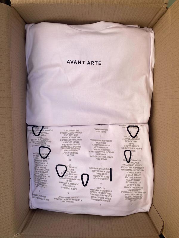 Pile of white t-shirts in a box