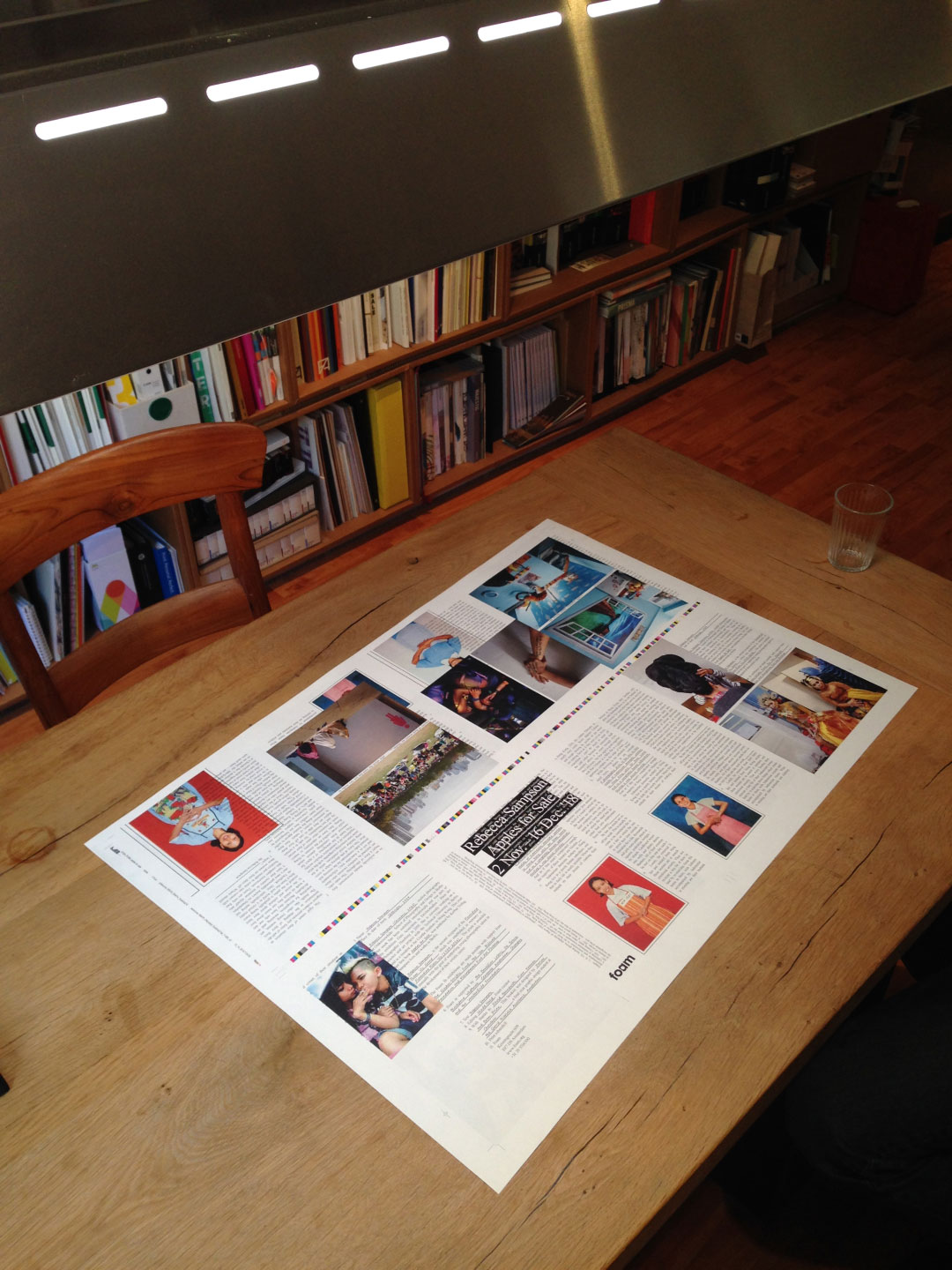 Sample of a magazine sheet on a wooden table